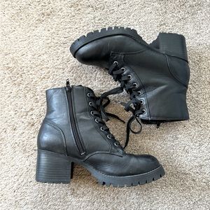 Black heeled combat boots